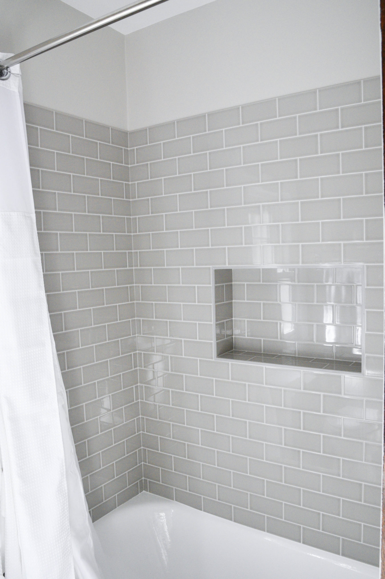 Home Bloggers Home Tour bathroom styling tips grey subway tiles www.homewithkeki.com