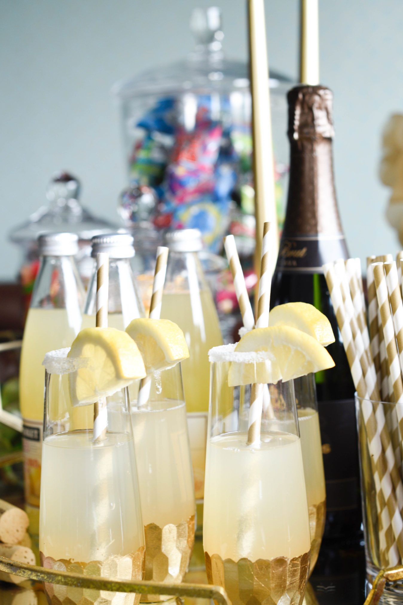 Oscar season is here and hosting a party can be easy, it's all about displaying those drinks and treats, some candy and champagne does the trick. find out more at www.homewithkeki.com