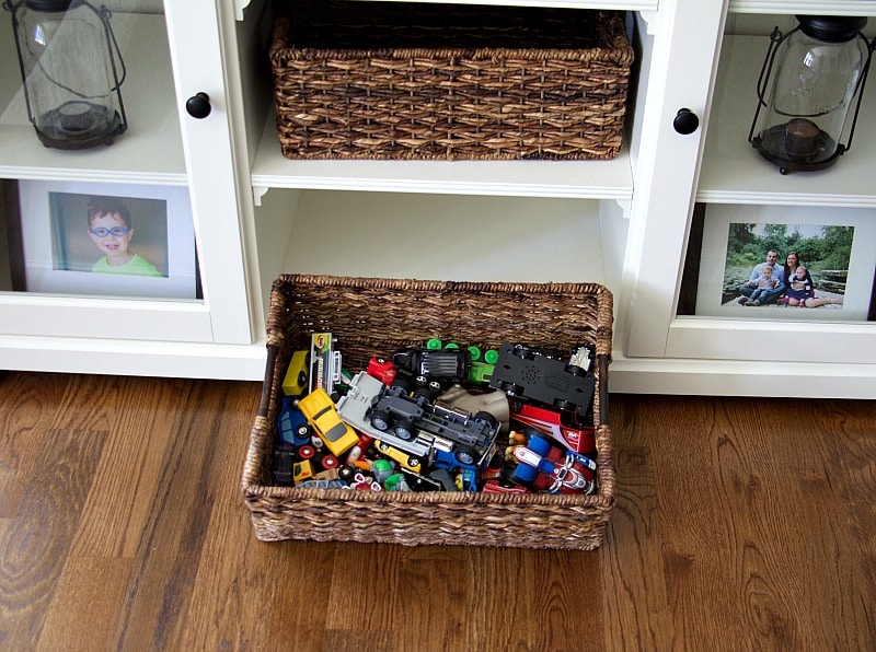 clever tips to organize all the kids toys so they don't takeover your family room or space. to find out more head over to www.homewithkeki.com #organization #tips #kids