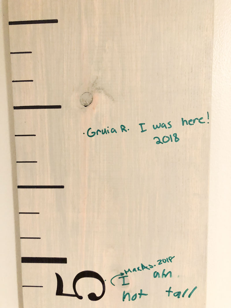 Wood growth charts are not just for measuring your kids through the years, but, use it as a friends sign-in / memory chart. See how www.homewithkeki.com #DIY #woodgrowthcharts