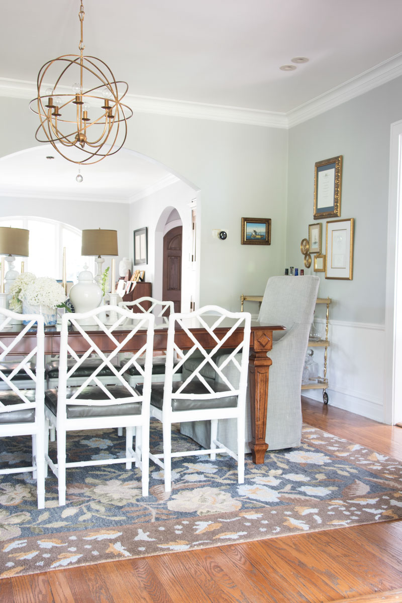 white dining chair mahogany table