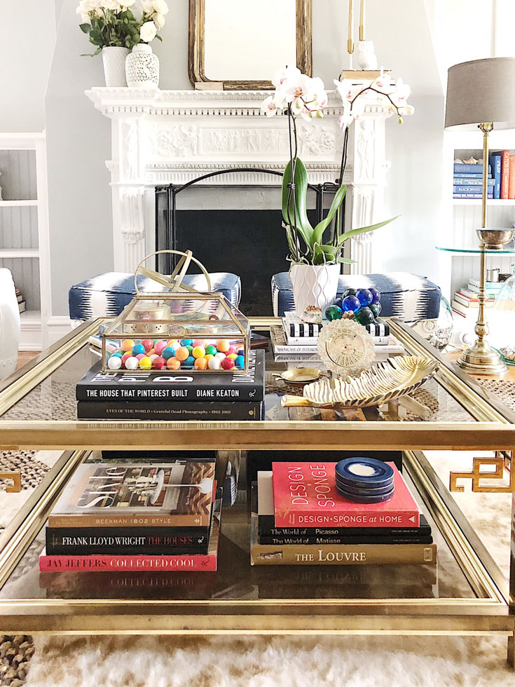 books and orchid on coffee table #coffeetablestyling