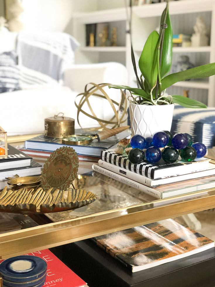 books and orchid on coffee table #coffeetablestyling