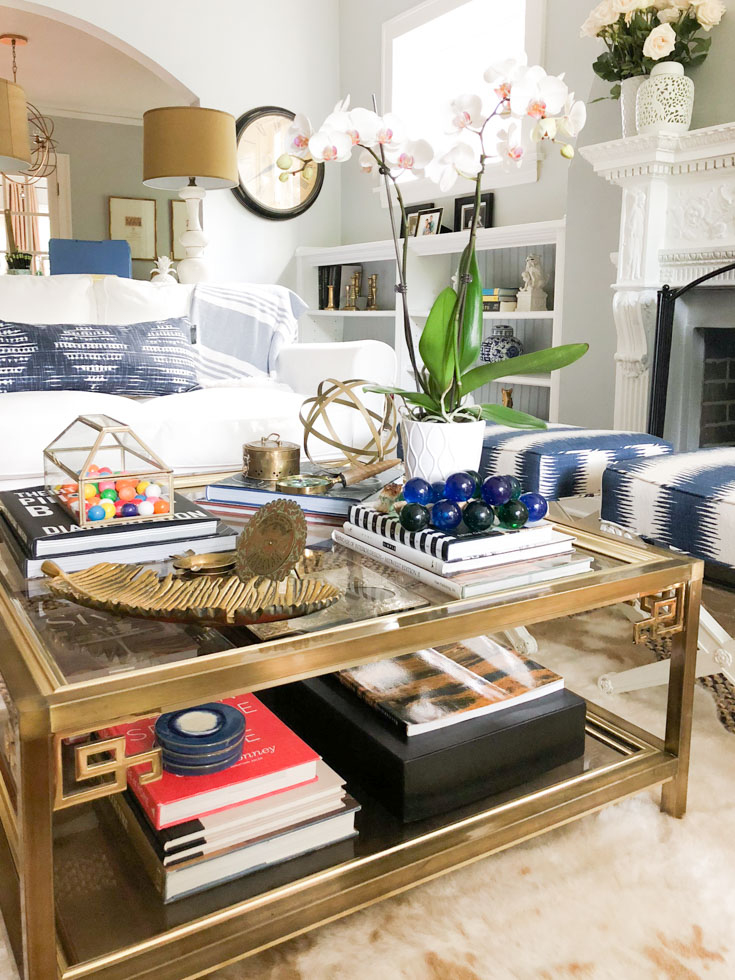 books and orchid on coffee table #coffeetablestyling