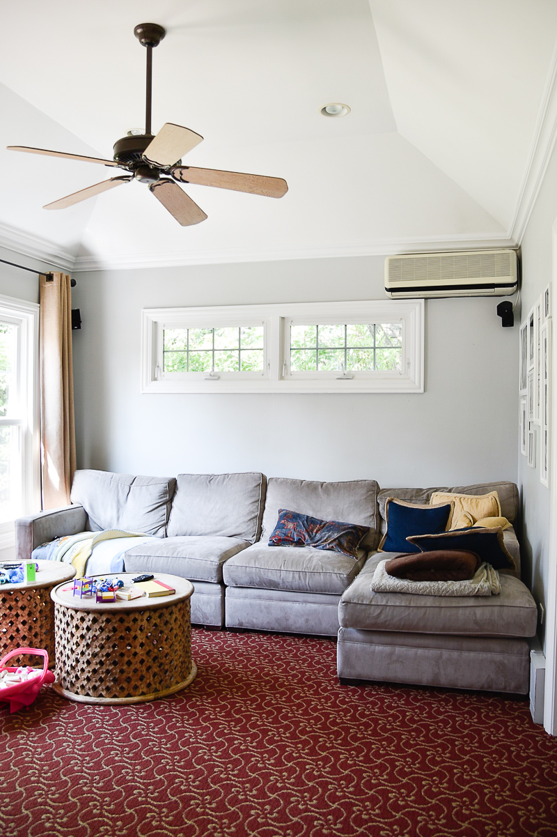 living room grey sectional grey walls 