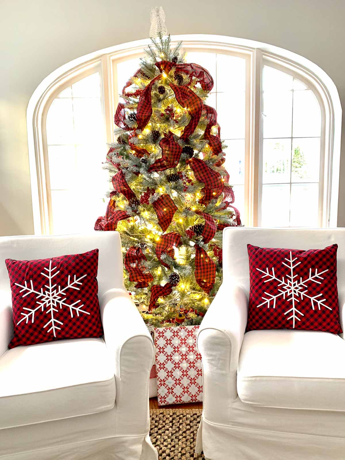 white christmas tree red ribbons white chars red pillows #christmasdecorating #christmastree