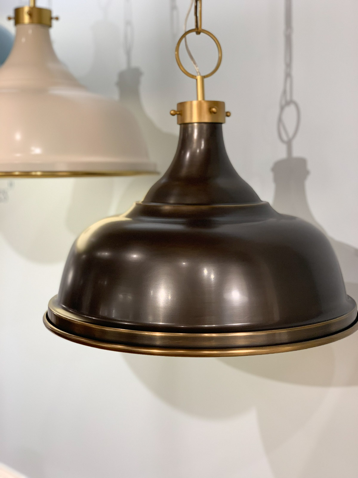 black and brass light fixture #interiors #livingrooms