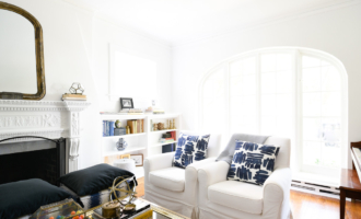 White living room with blue pillows