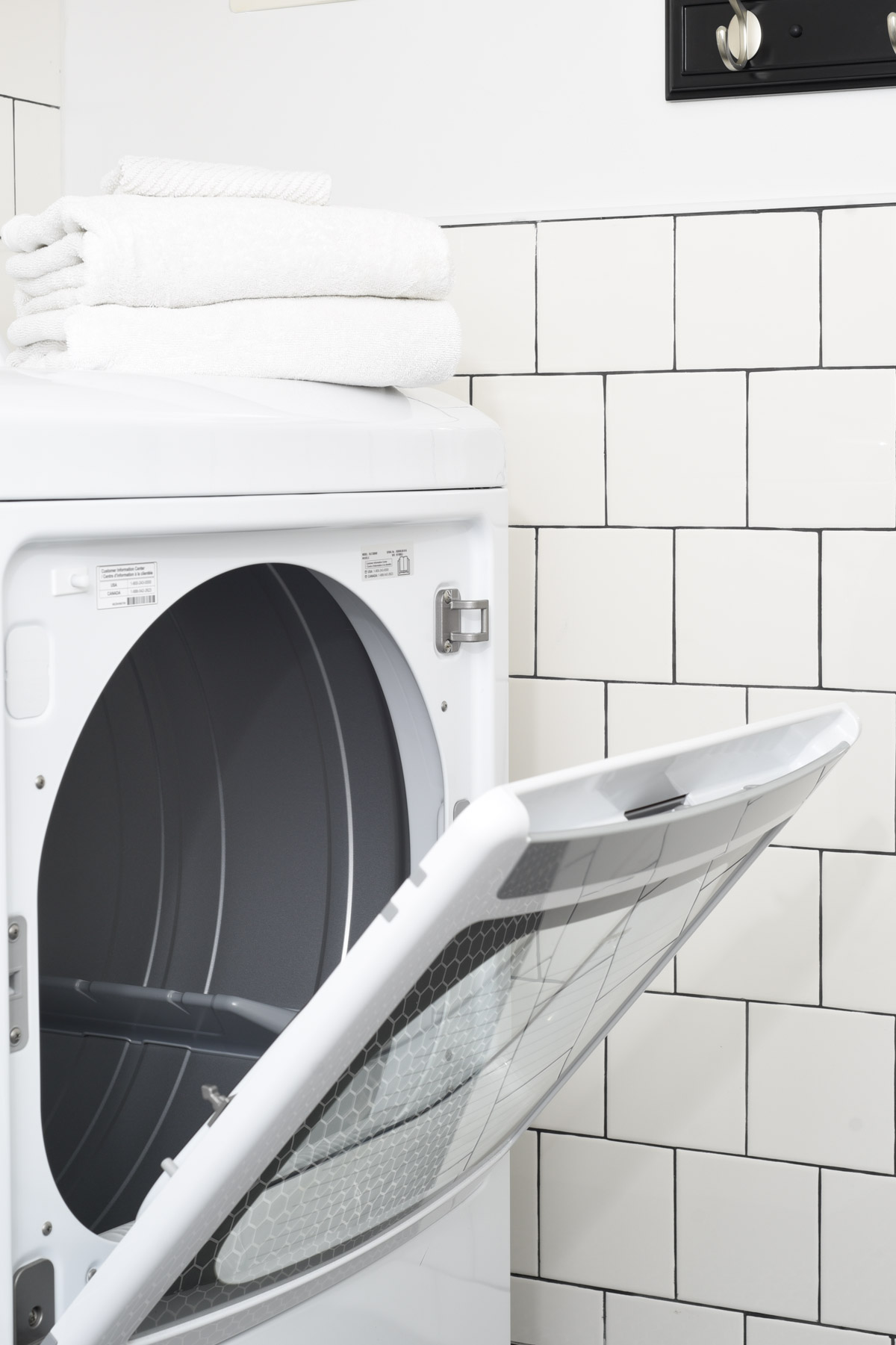 tiled wall laundry room #laundryroom